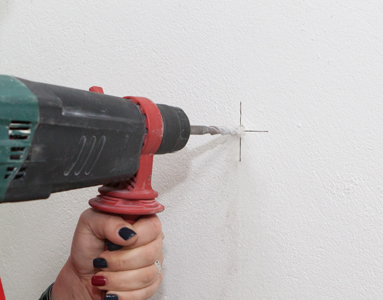 Drill a hole with a diameter of about 8 mm at the marked position. After drilling the hole, clean inside the hole.